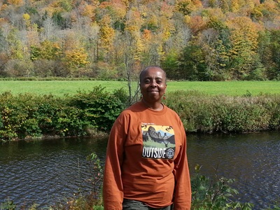 PA Faculty Juanita Gardner in front of pond